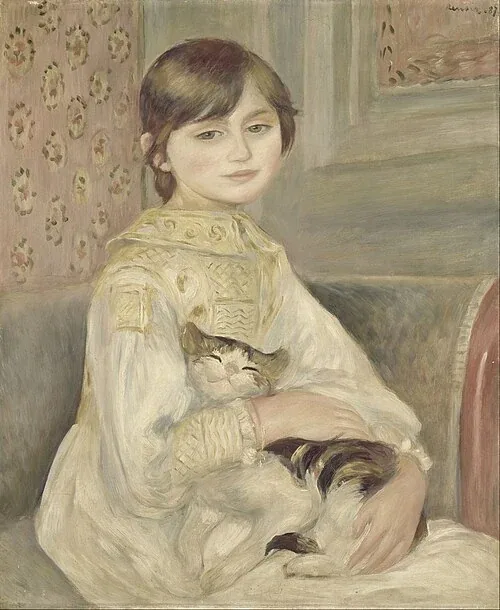 Julie Manet sits in a pale dress with a tabby kitten nestled in her lap, its eyes almost closed.