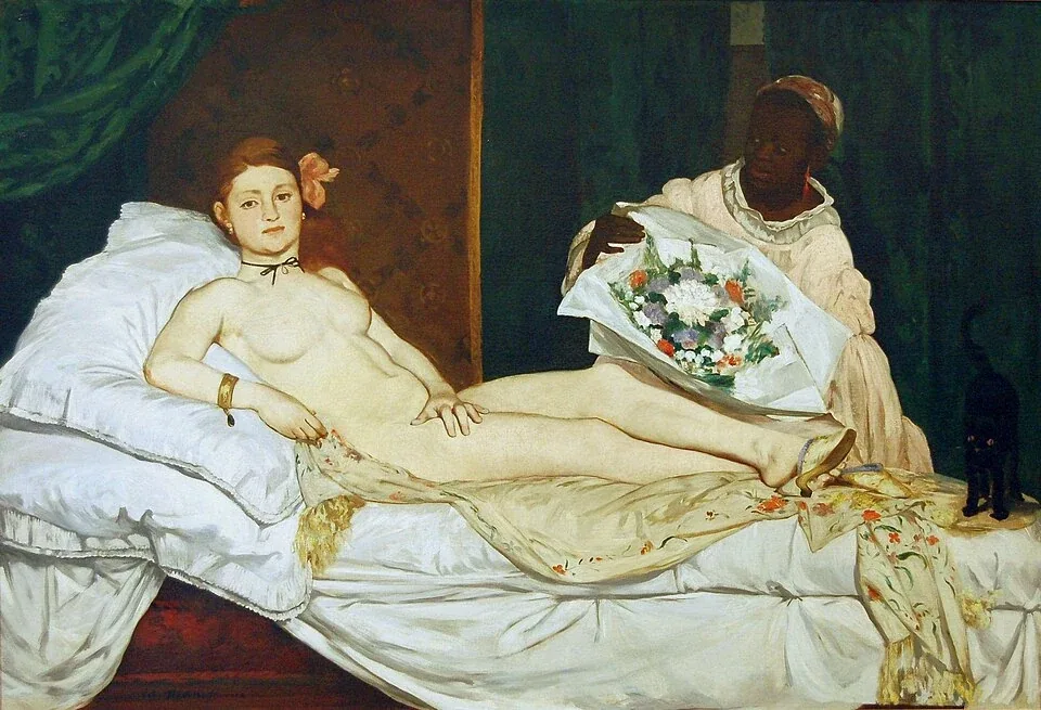 Manet's Olympia shows a reclining nude woman, an attendant carrying flowers, and a small black cat with an upright tail at the right edge of the bed.